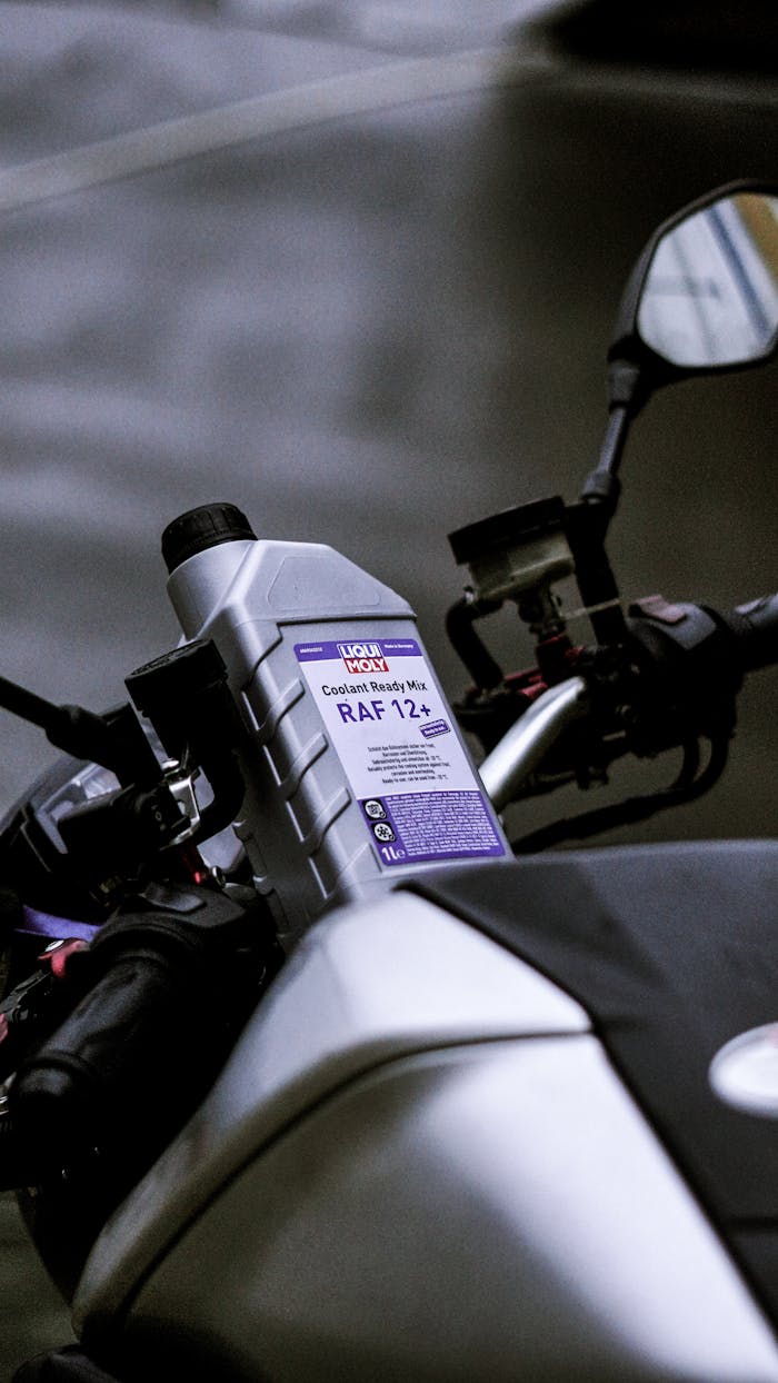 Liqui Moly oil container on a parked motorcycle in Jakarta.